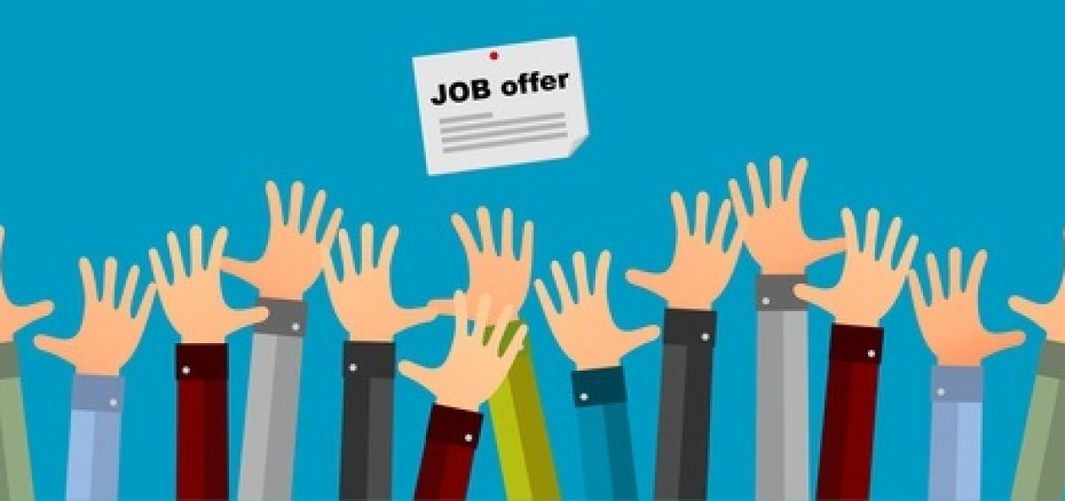 Hands reaching for a job offer posting