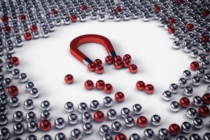 Big magnet attracts only the red balls