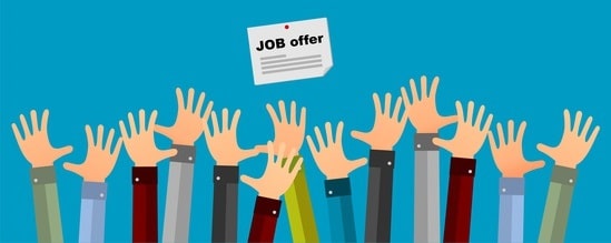 Hands reaching for a job offer posting