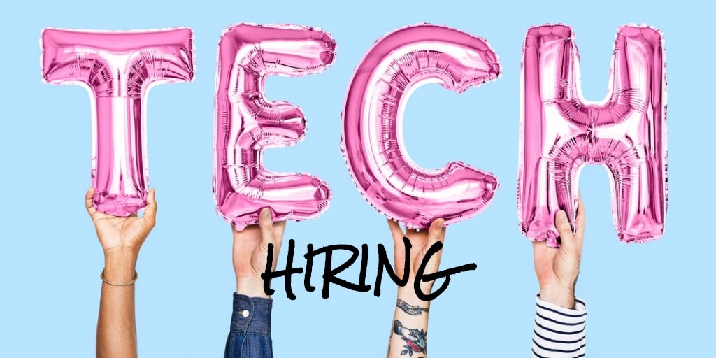 4 arms each holding a balloon in the shape of a letter that spell the word tech. Hiring is printed below the word tech.