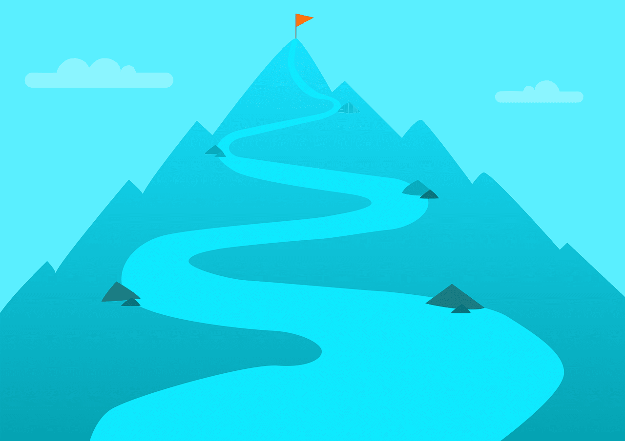 A path that leads to the top of a mountain with a flag on top. Meant to signify destination or career goals
