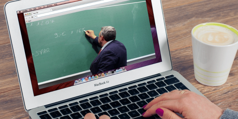 Person viewing a class via their laptop