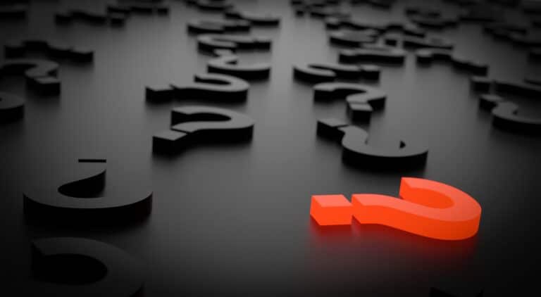 Question marks strewn across the floor with one highlighted
