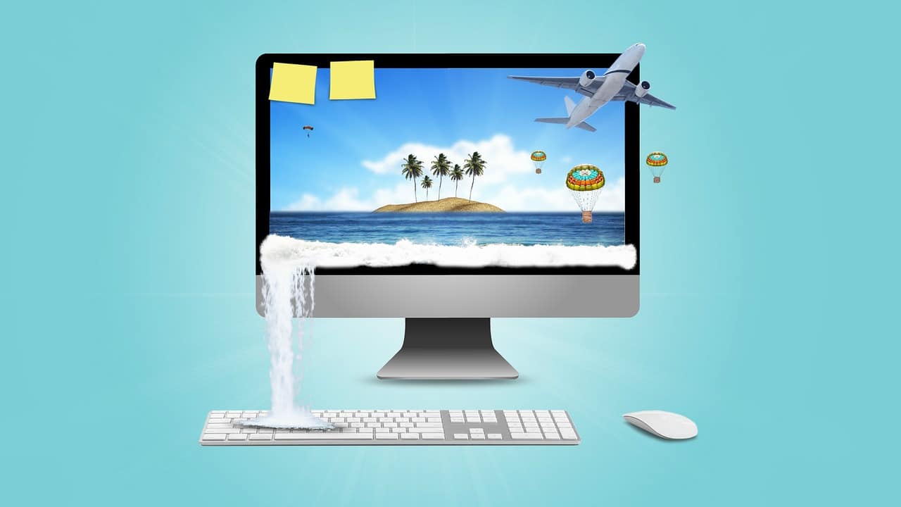 A computer screen with scenes of summer vacations spilling out
