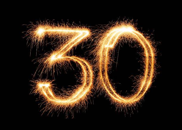 The number 30 written in sparklers