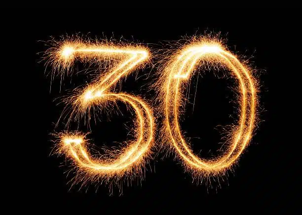 The number 30 written in sparklers