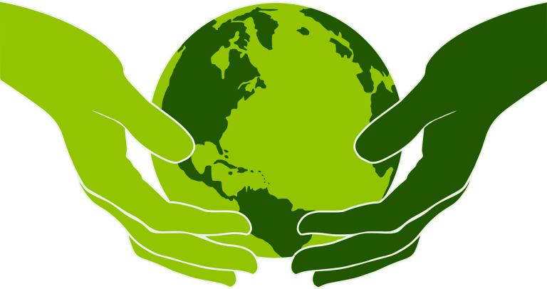 Green hands holding a green Earth
