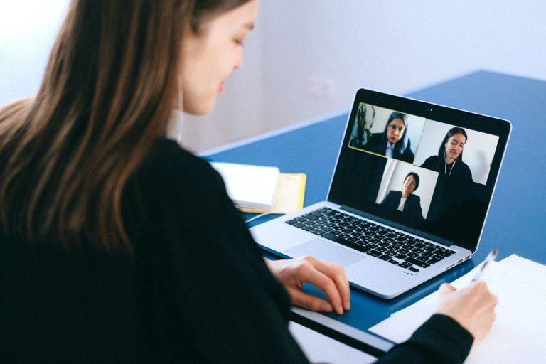 A remote worker communicating with coworkers.