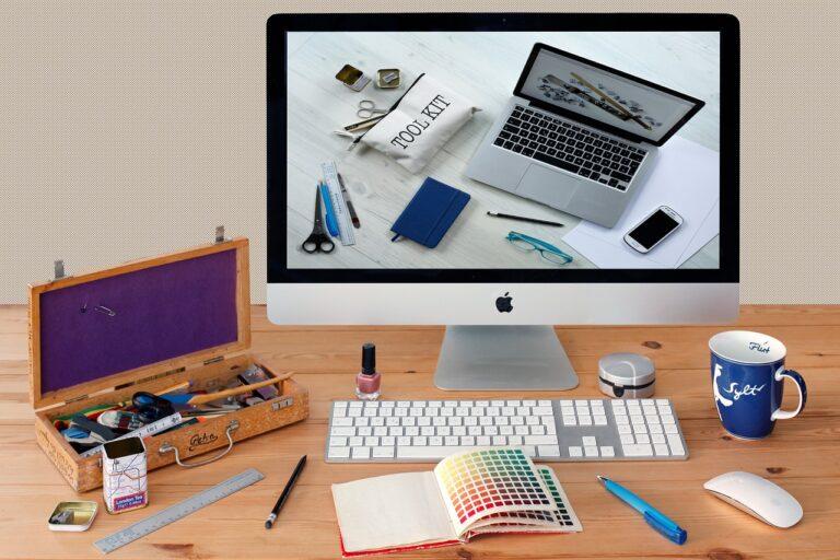 A tool kit in front of and being displayed on a computer monitor meant to signify IT tools